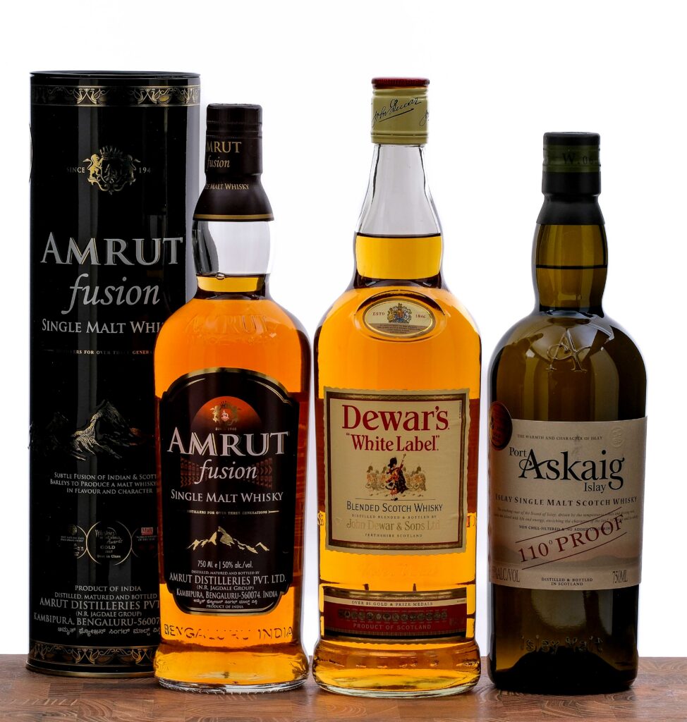 Amrut/Dewar's/Port Askaig Scotch and Whiskey Group (3 Bottles)