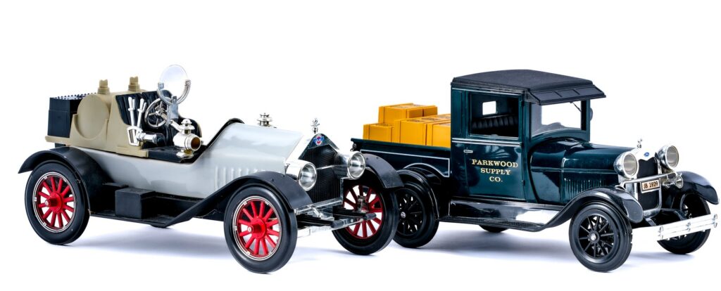Two Jim Beam Bourbon Figural Vehicle Decanters